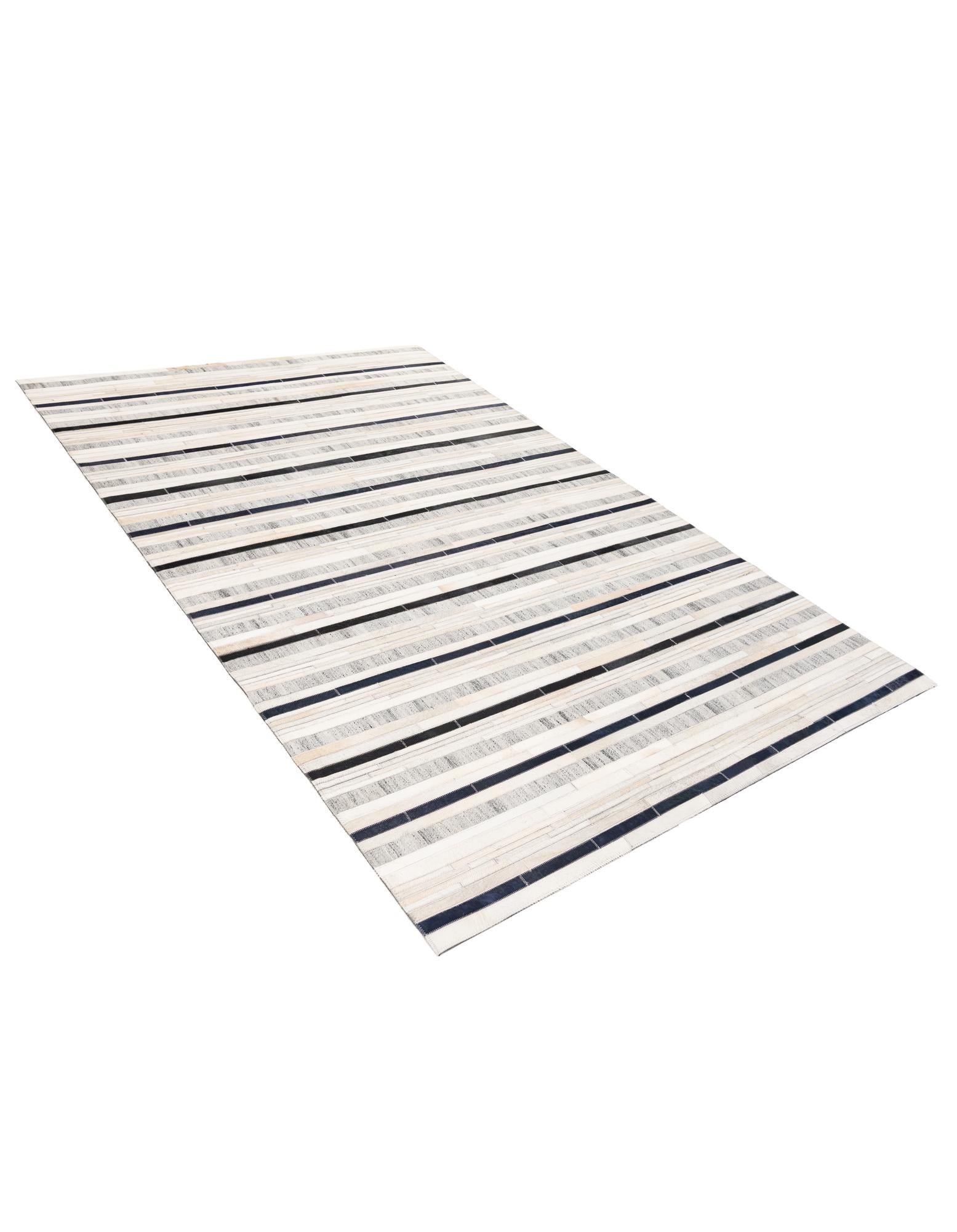 5' 1 x 7' 10 Cowhide Stocks Rug