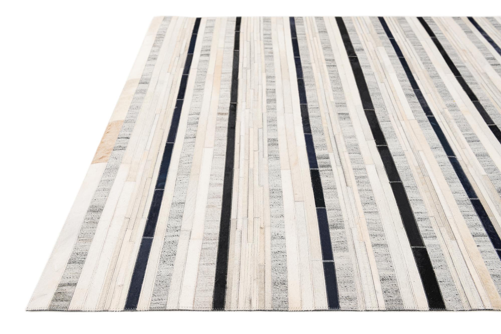 5' 1 x 7' 10 Cowhide Stocks Rug