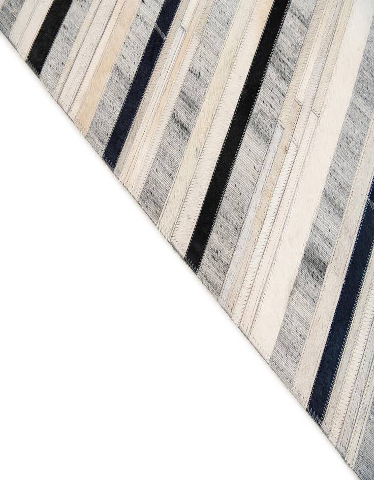 Detail image of 5' 1 x 7' 10 Cowhide Stocks Rug