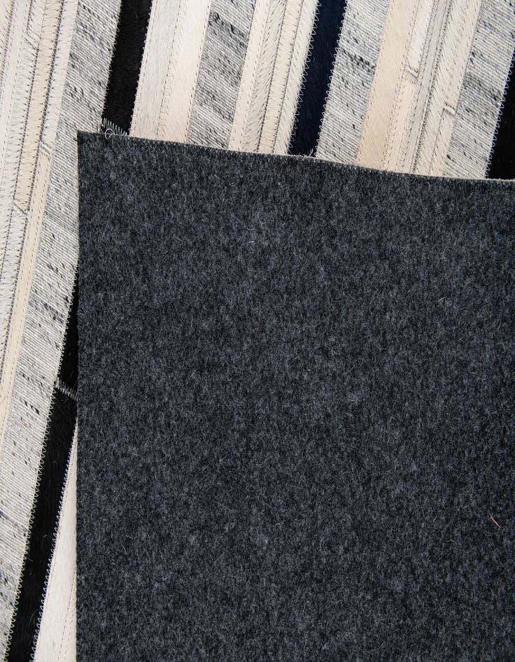 Detail image of 5' 1 x 7' 10 Cowhide Stocks Rug