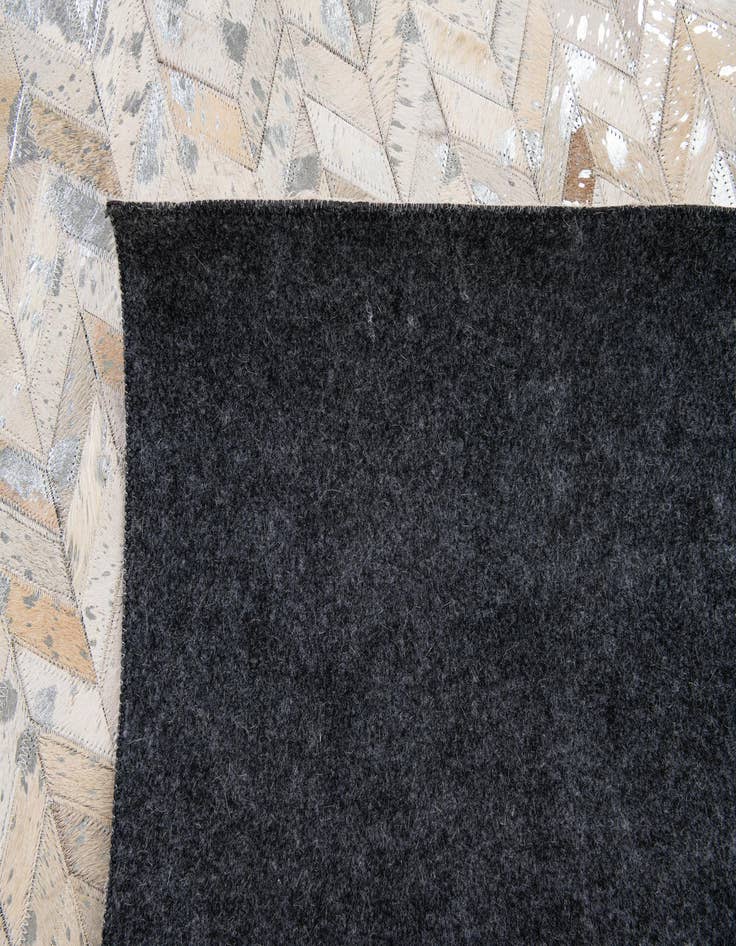 Detail image of 5' 1 x 8' Cowhide Stocks Rug