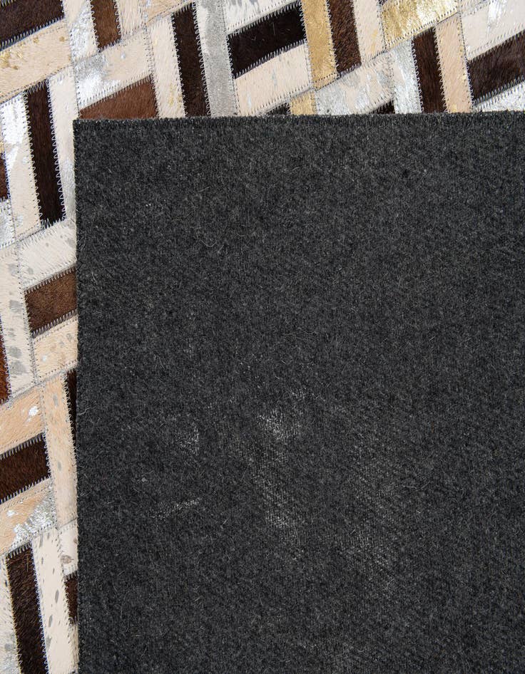Detail image of 4' 11 x 7' 11 Cowhide Stocks Rug