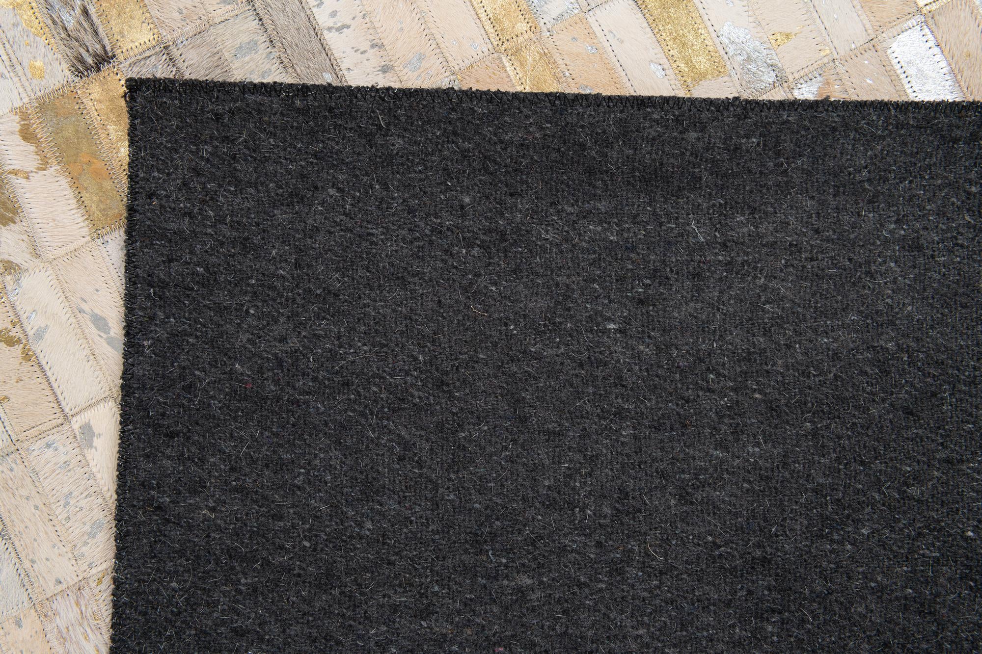 4' 11 x 7' 10 Cowhide Stocks Rug