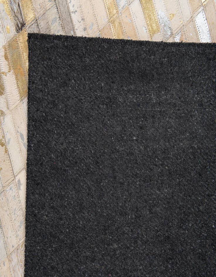 Detail image of 4' 11 x 7' 10 Cowhide Stocks Rug