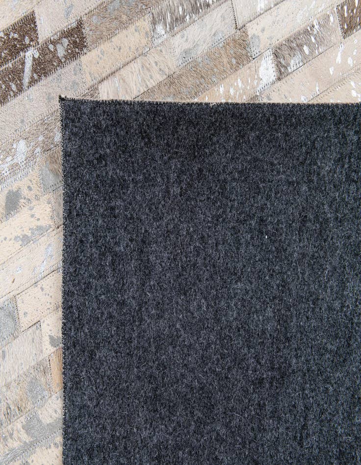 Detail image of 5' 1 x 7' 11 Cowhide Stocks Rug