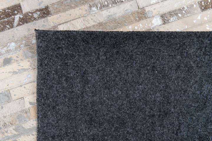 5' 1 x 7' 11 Cowhide Stocks Rug