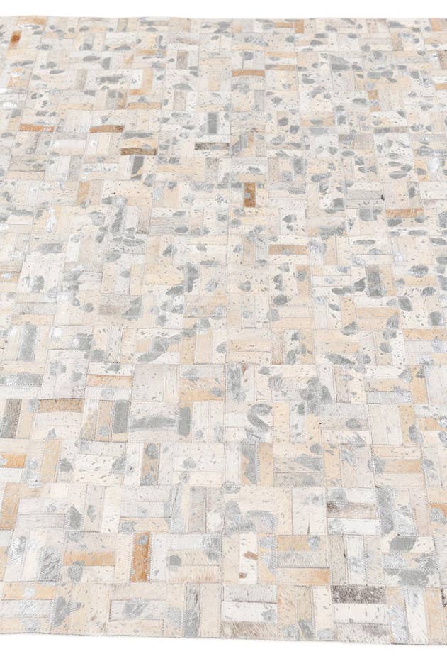 Detail image of 4' 11 x 8' Cowhide Stocks Rug