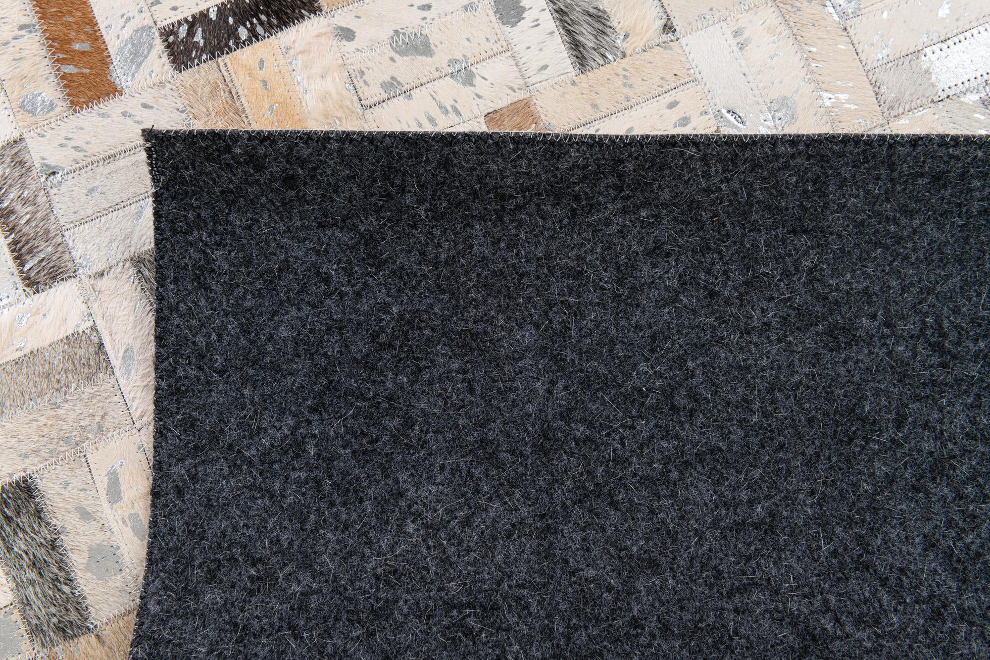 5' 3 x 7' 10 Cowhide Stocks Rug