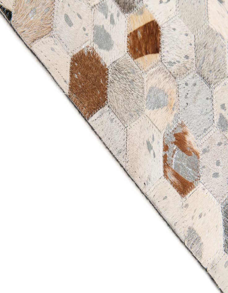 Detail image of 5' x 7' 11 Cowhide Stocks Rug