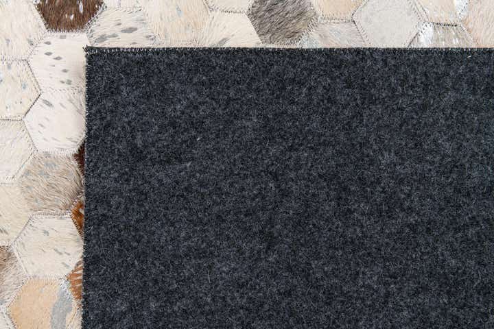 5' x 7' 11 Cowhide Stocks Rug