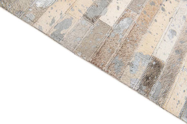 Detail image of 5' 1 x 7' 11 Cowhide Stocks Rug
