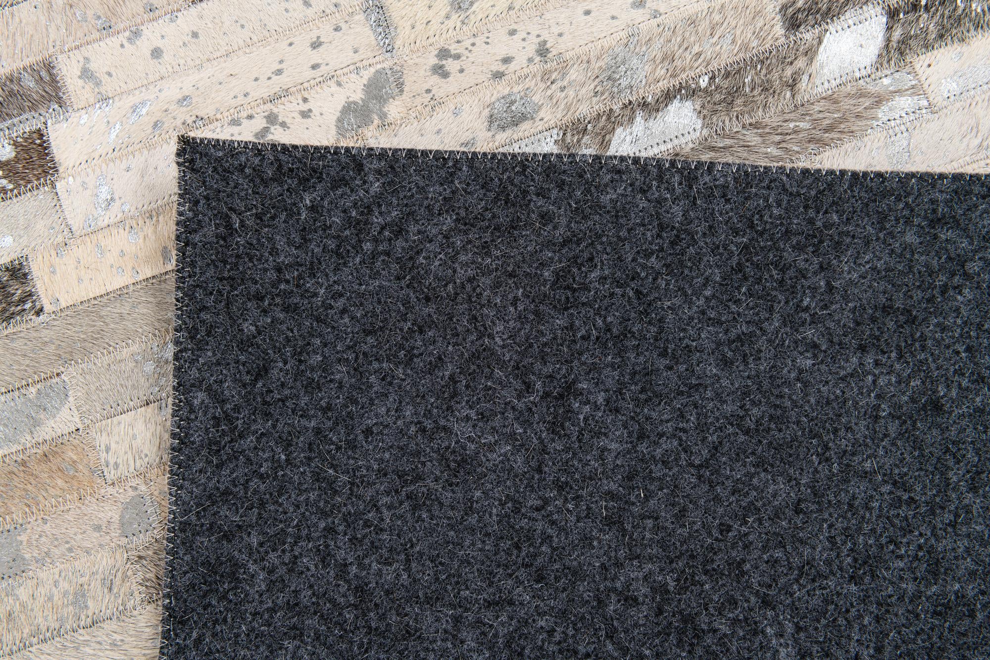 5' 1 x 7' 11 Cowhide Stocks Rug