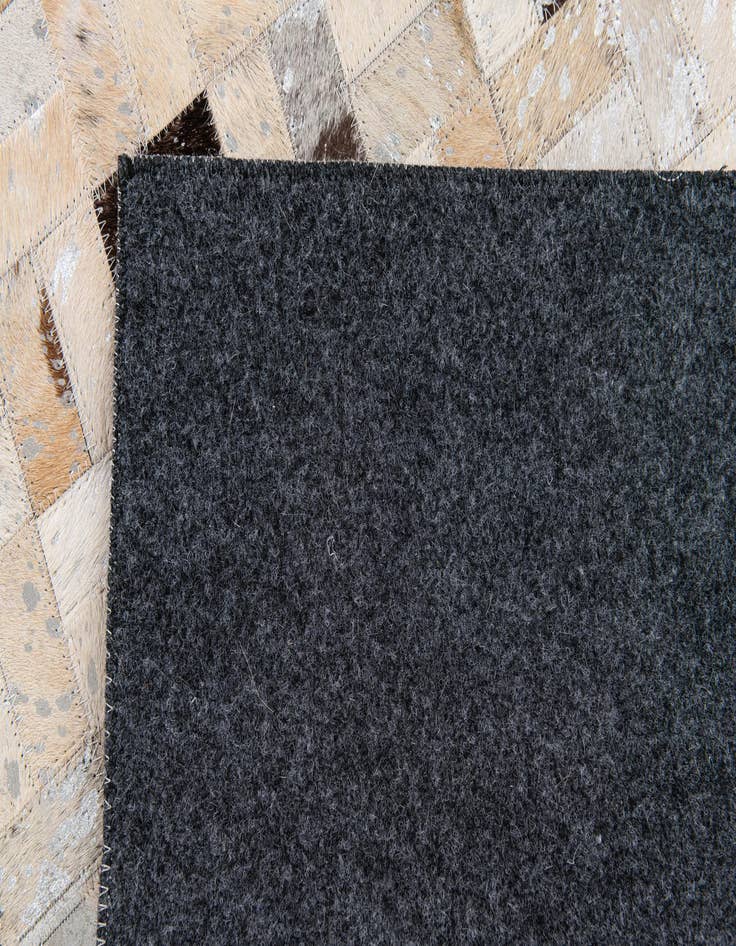 Detail image of 5' 3 x 7' 3 Cowhide Stocks Rug