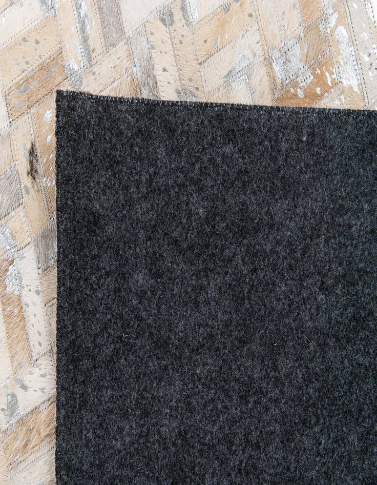 Detail image of 4' 11 x 8' Cowhide Stocks Rug