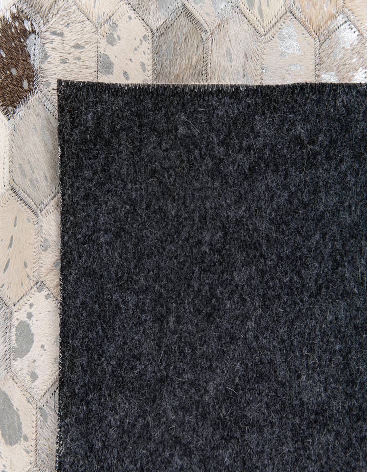 Detail image of 5' 1 x 8' Cowhide Stocks Rug