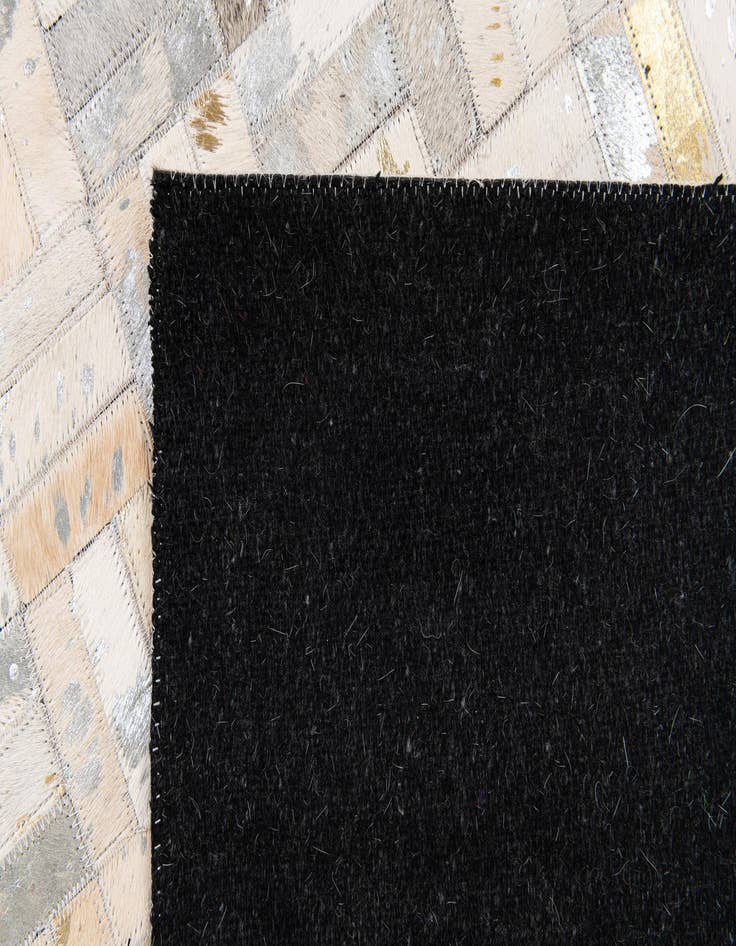 Detail image of 5' x 8' Cowhide Stocks Rug