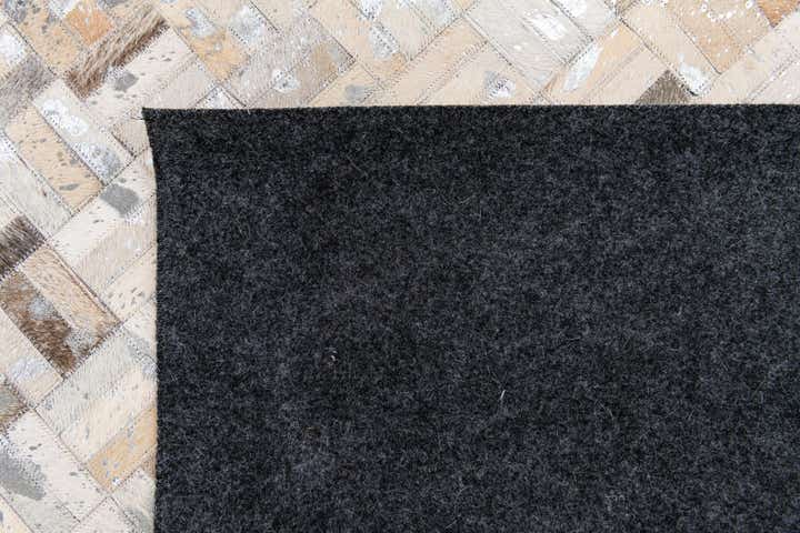 4' 11 x 7' 10 Cowhide Stocks Rug