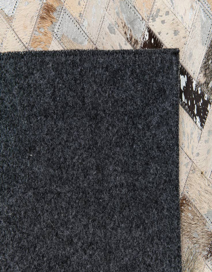 Detail image of 5' 4 x 7' 7 Cowhide Stocks Rug