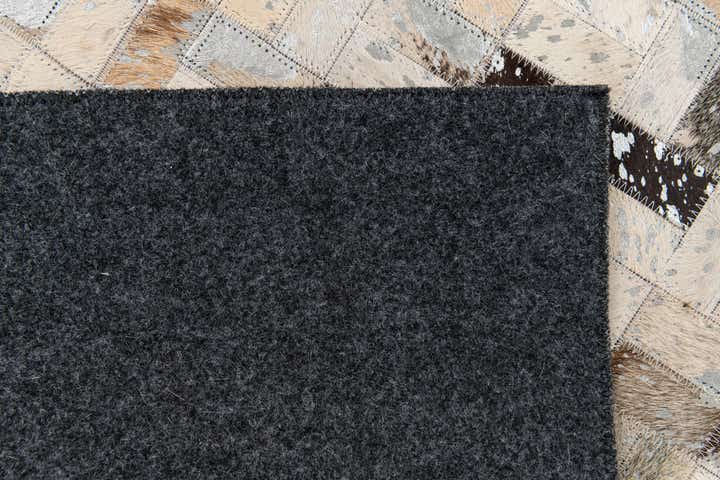 5' 4 x 7' 7 Cowhide Stocks Rug