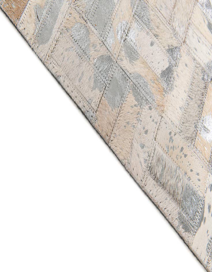 Detail image of 4' 11 x 8' 1 Cowhide Stocks Rug