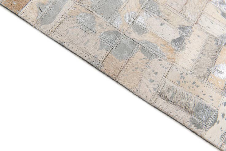Detail image of 4' 11 x 8' 1 Cowhide Stocks Rug
