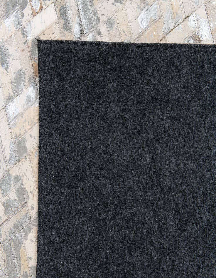 Detail image of 4' 11 x 8' 1 Cowhide Stocks Rug