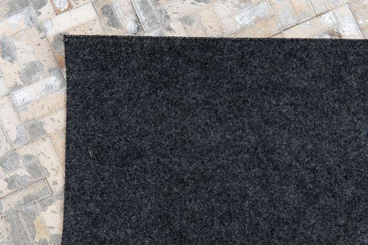 4' 11 x 8' 1 Cowhide Stocks Rug
