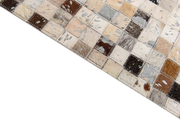 Detail image of 5' 3 x 7' 5 Cowhide Stocks Rug