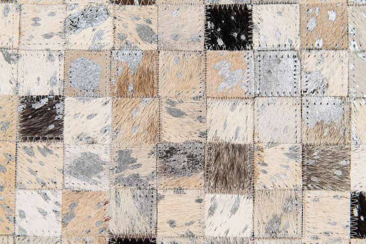 5' 1 x 7' 8 Cowhide Stocks Rug
