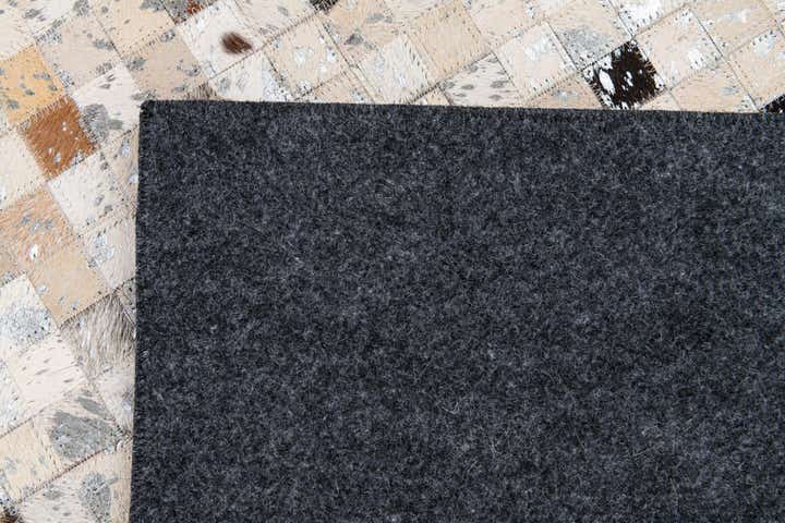 5' 1 x 7' 8 Cowhide Stocks Rug