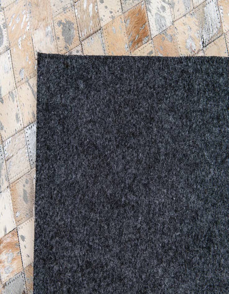 Detail image of 5' 3 x 7' 5 Cowhide Stocks Rug