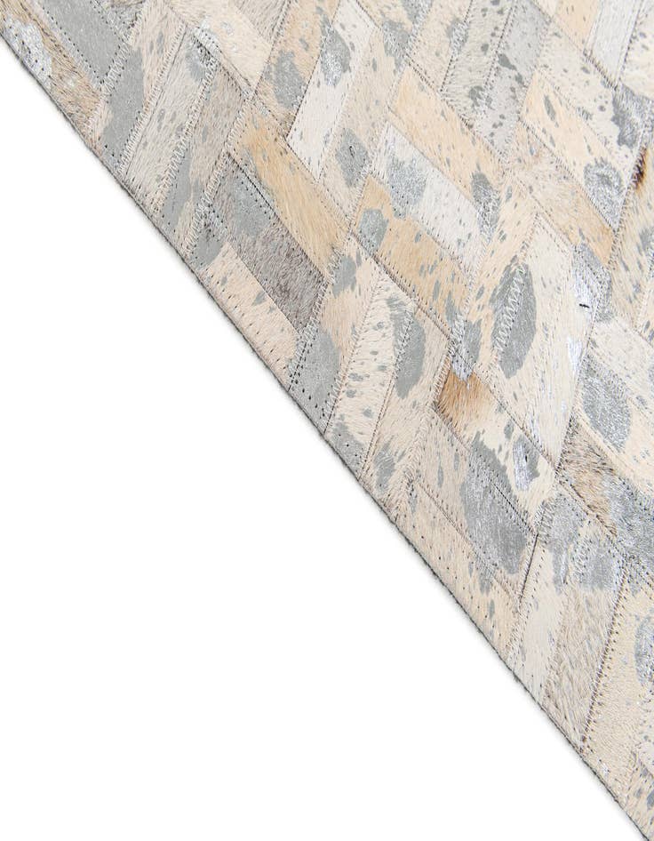 Detail image of 4' 11 x 8' 1 Cowhide Stocks Rug