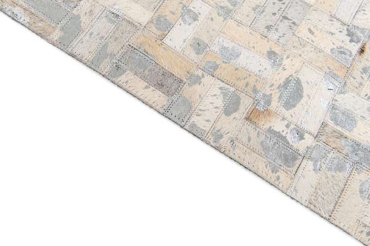 4' 11 x 8' 1 Cowhide Stocks Rug