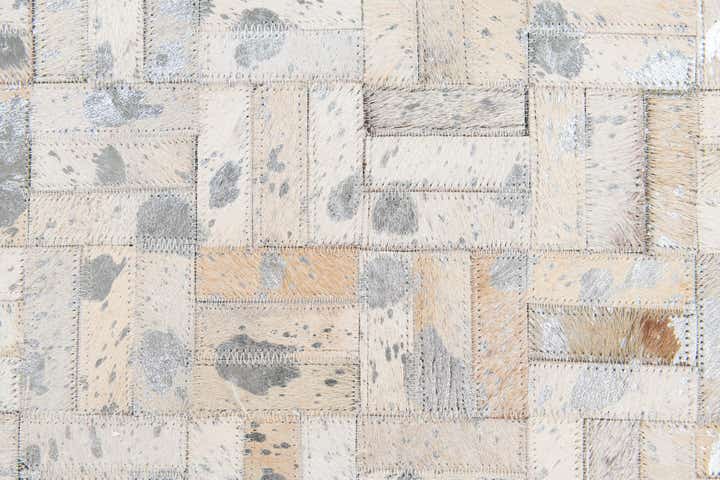 4' 11 x 8' 1 Cowhide Stocks Rug