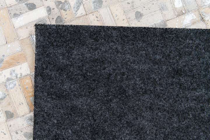 4' 11 x 8' 1 Cowhide Stocks Rug