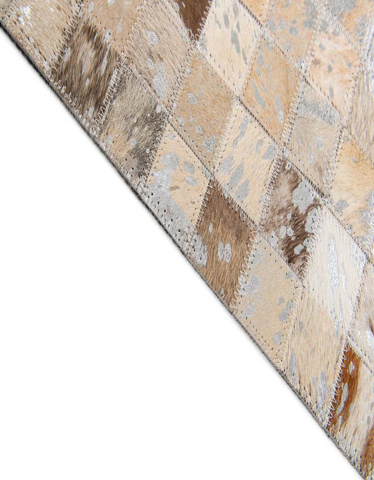 Detail image of 5' 2 x 7' 5 Cowhide Stocks Rug