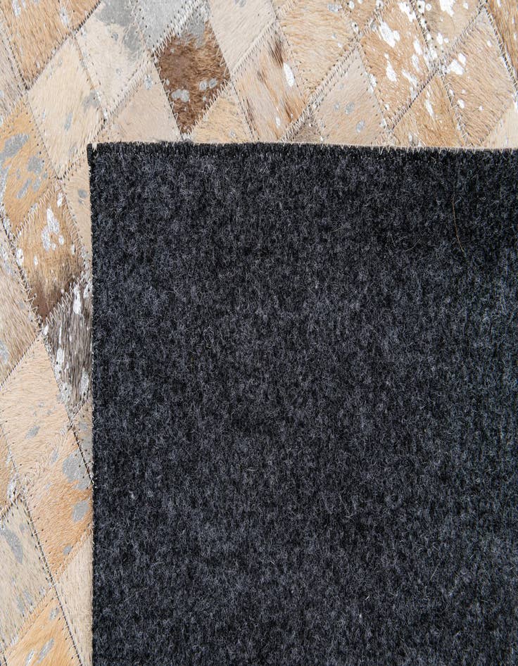 Detail image of 5' 2 x 7' 5 Cowhide Stocks Rug