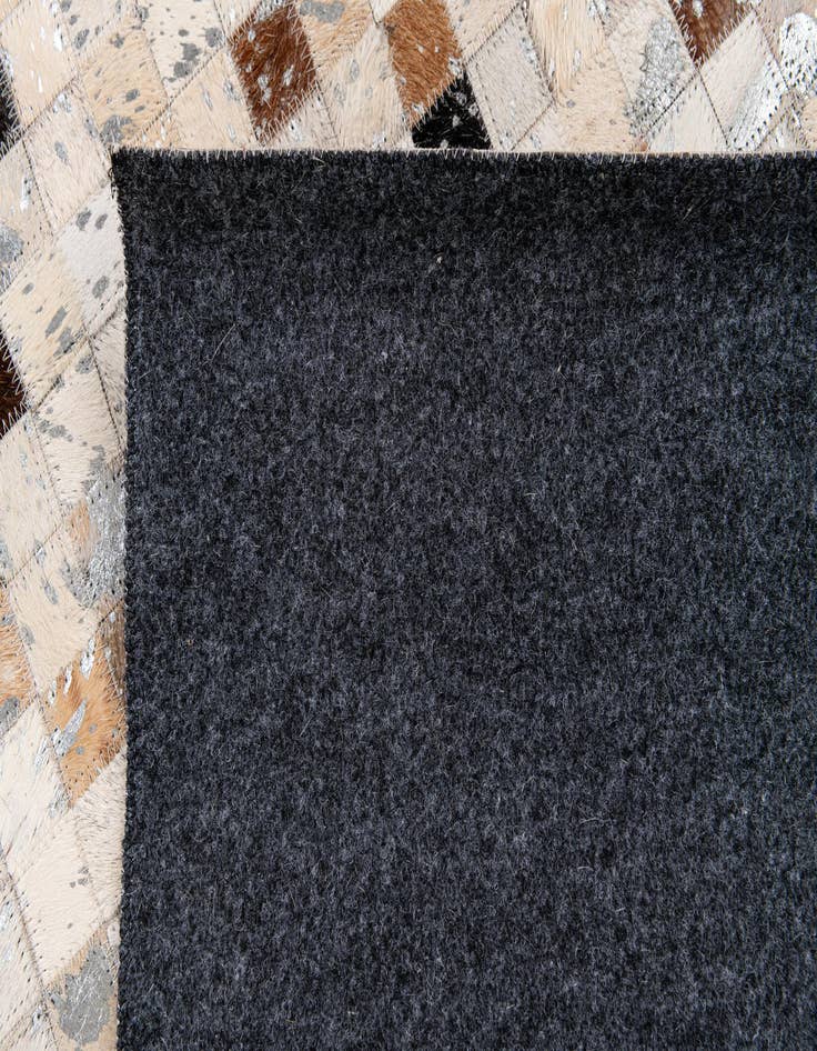 Detail image of 5' 1 x 7' 7 Cowhide Stocks Rug