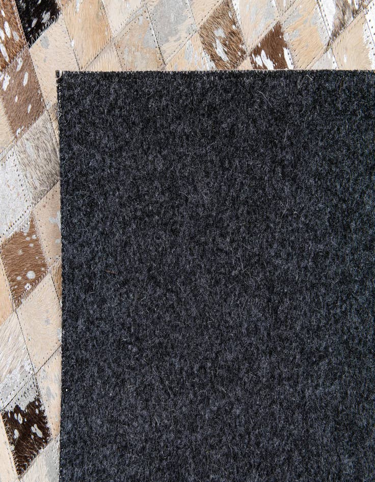 Detail image of 5' 3 x 7' 6 Cowhide Stocks Rug