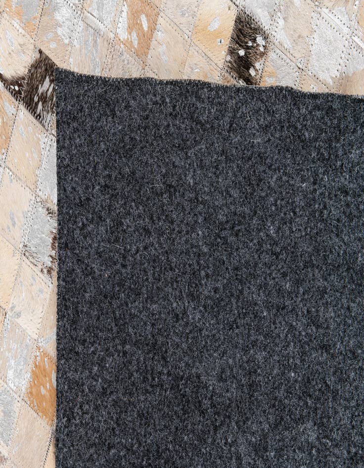 Detail image of 5' 5 x 7' 8 Cowhide Stocks Rug