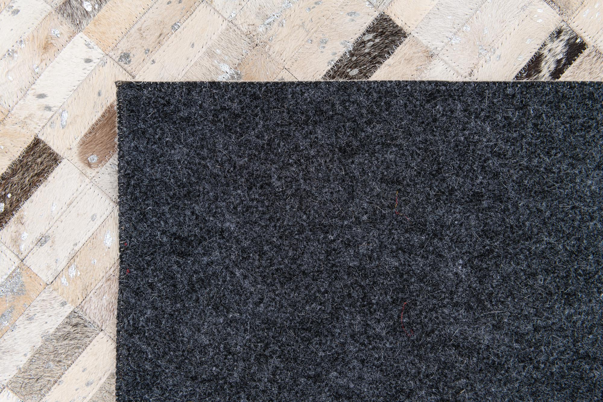 7' 11 x 9' 11 Cowhide Stocks Rug
