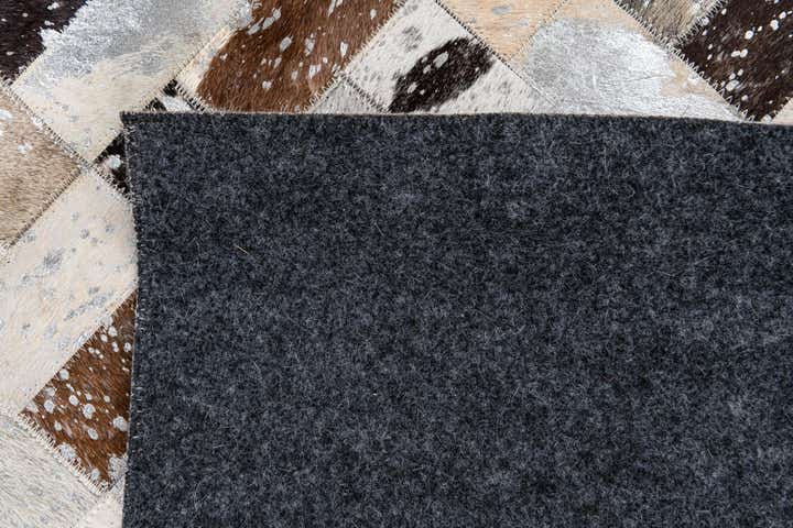 7' 11 x 9' 10 Cowhide Stocks Rug