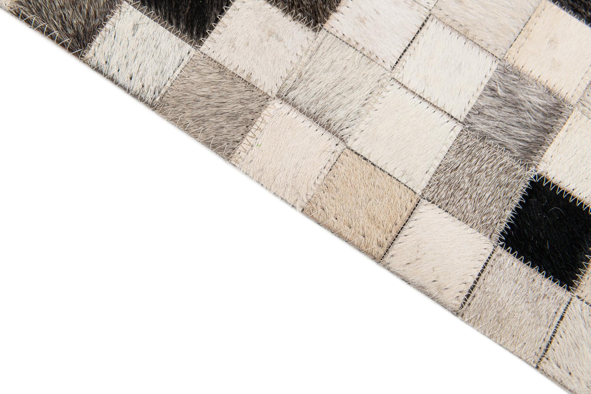 8' 1 x 9' 11 Cowhide Stocks Rug