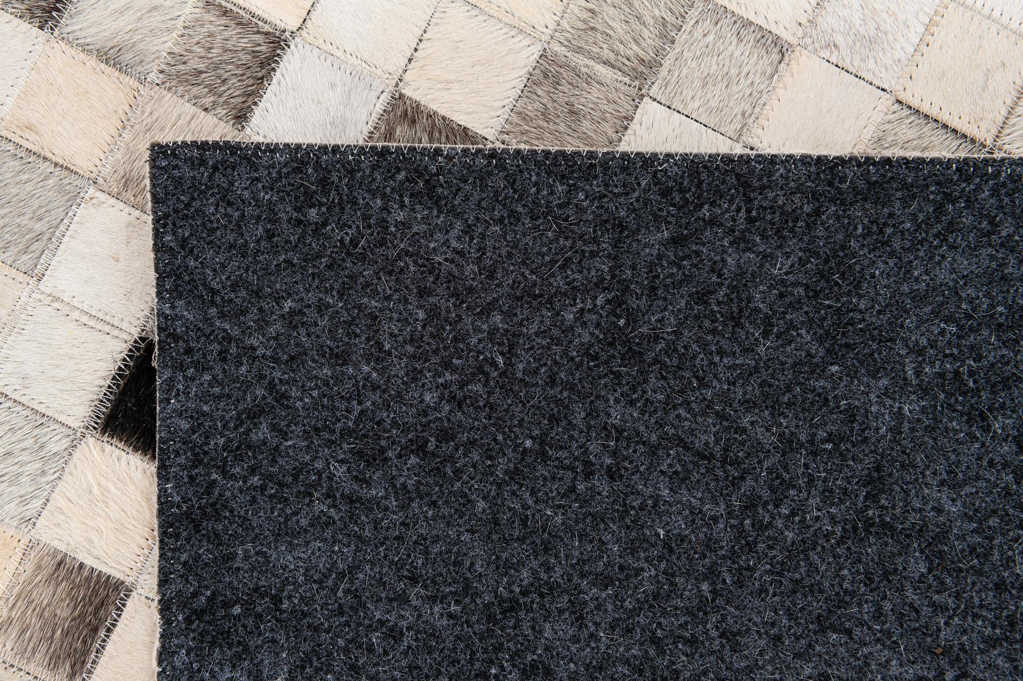 8' 1 x 9' 11 Cowhide Stocks Rug
