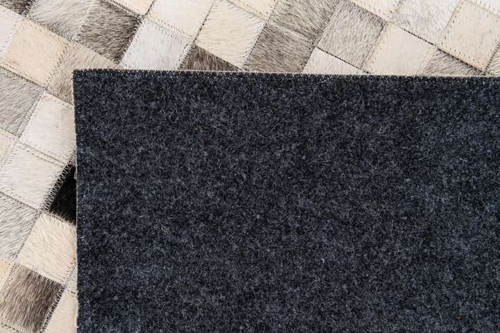 8' 1 x 9' 11 Cowhide Stocks Rug