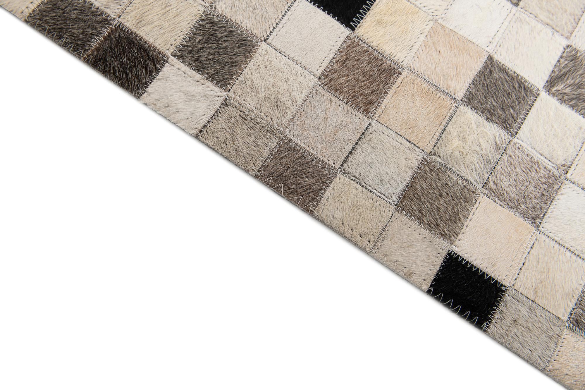 8' x 9' 10 Cowhide Stocks Rug