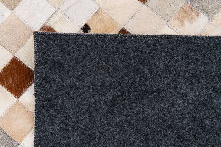 8' 1 x 9' 10 Cowhide Stocks Rug