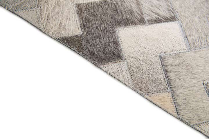 5' 7 x 7' 10 Cowhide Stocks Rug