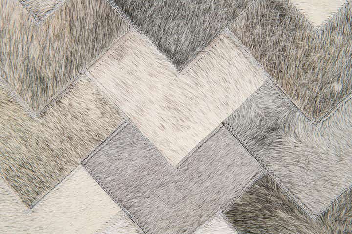 5' 7 x 7' 10 Cowhide Stocks Rug
