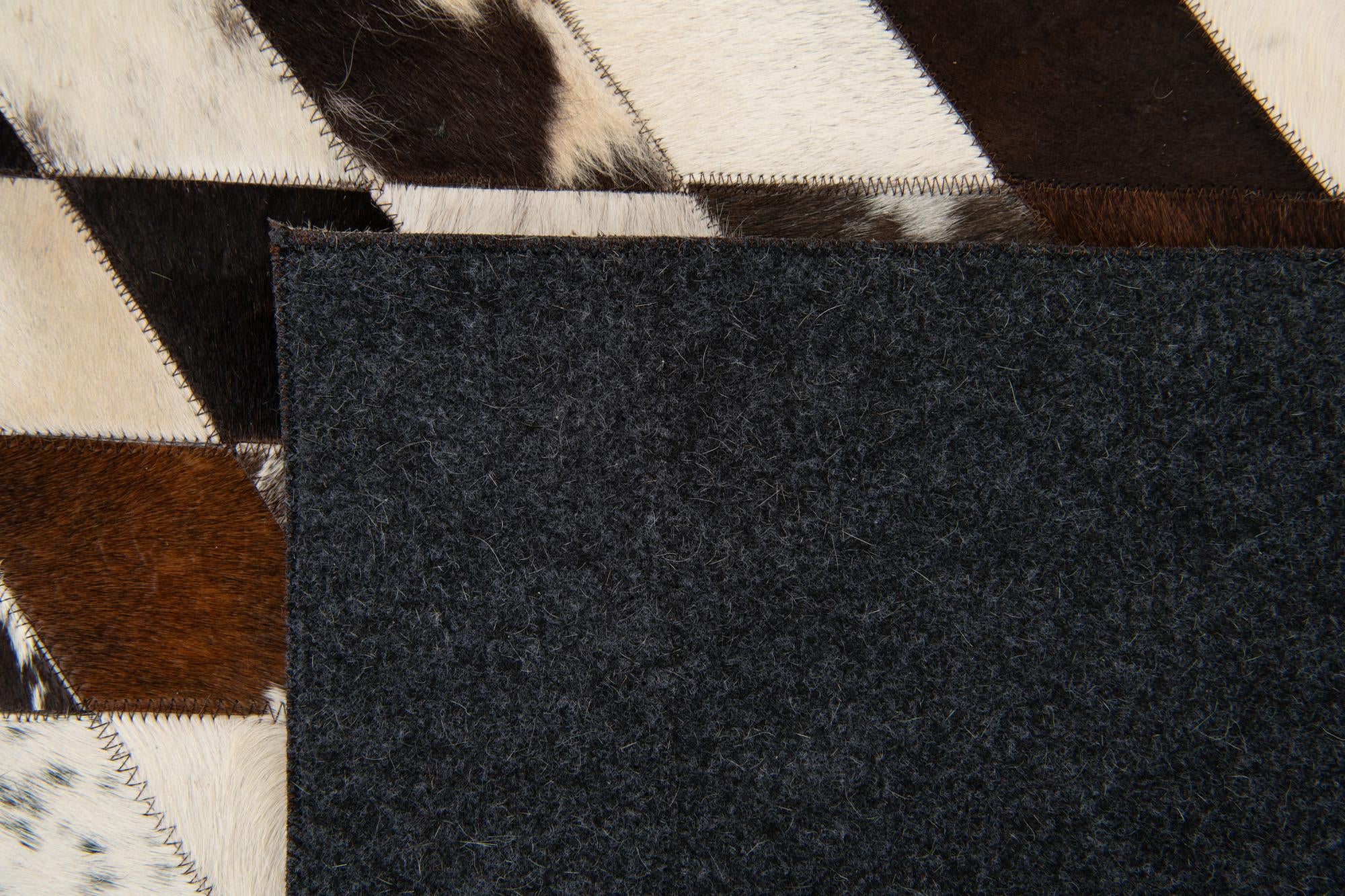 5' 8 x 8' Cowhide Stocks Rug